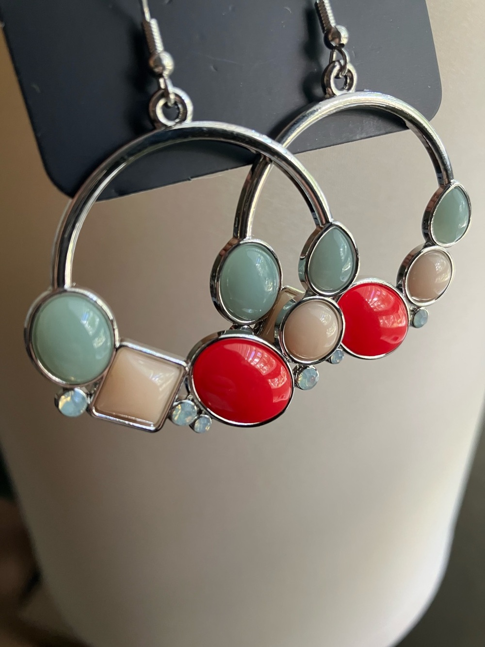 Silver hoop earrings with multicolored beads